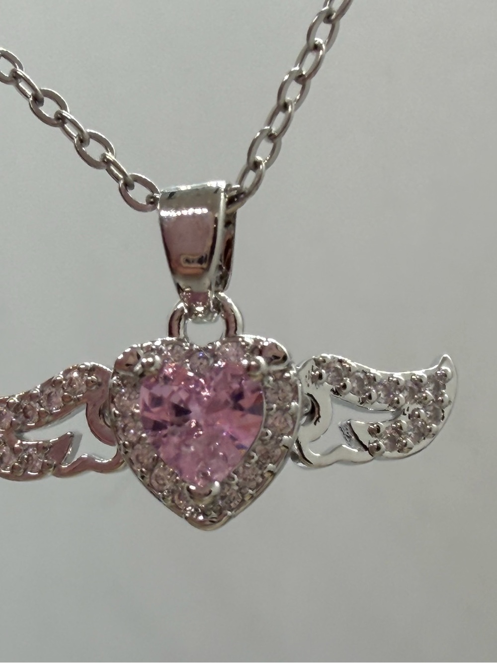 Silver Winged Heart Necklace with Pink Stone